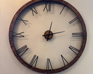 Two Piece Battery Operated Metal Wall Clock. Measures 5' D.