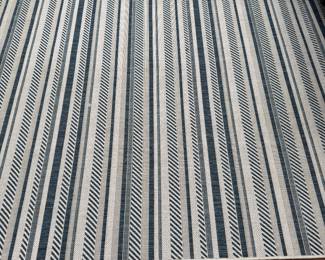 Indoor / Outdoor Rug. Measures 8' x 10'.