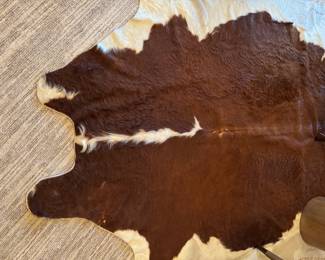 Cowhide Rug. Measures 4' x 6'.