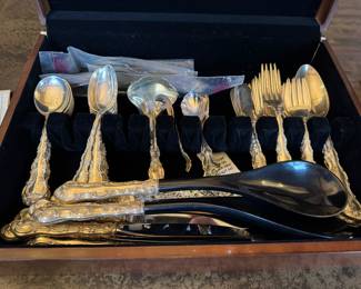 Gorham Sterling Silver Flatware. Set Includes — 8 Soup
— 12 Spoons
— 8 Knives
— 8 Serving Pieces
— 8 Salad Forks
— 8 Forks
— 8 Butter
Sterling Handled Salad Servers