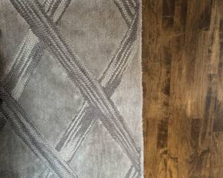 Grey Graphic Area Rug. Measures 8' 3" x 10' 2".