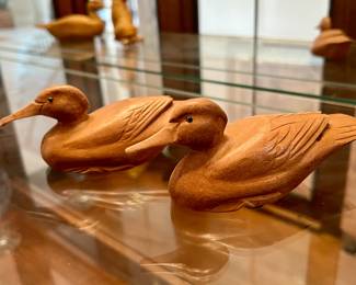 Carved wood duck figurines