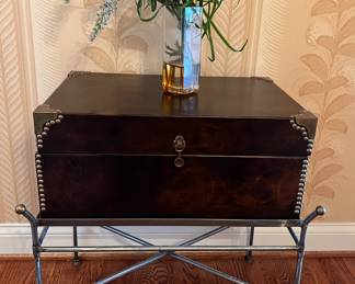 Leather storage chest on metal stand
