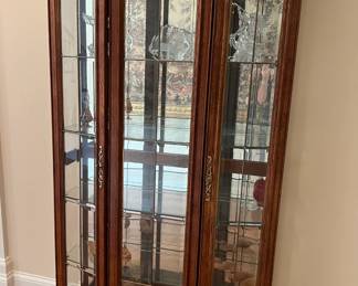 Curved curio cabinet