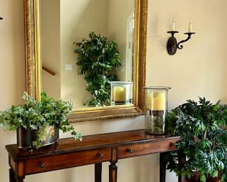 Theodore Alexander entryway table with large gold framed mirror