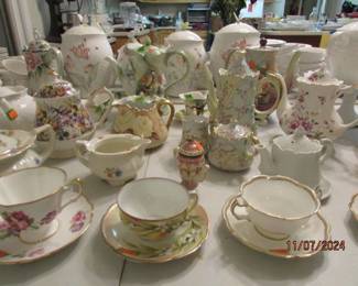 more teapots and teacups/saucers