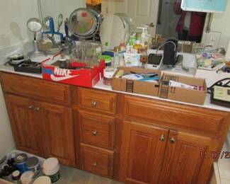 assorted toiletry items and mirrors