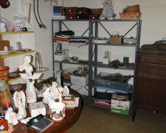 Metal shelving units, are for sale.  Everything else on those shelving units are going to be either $1 each, or a $1 an armload, you decide