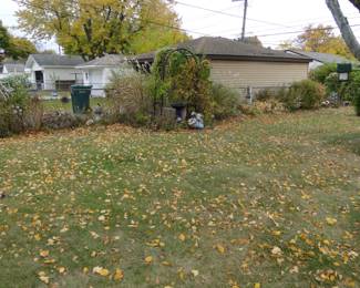 The backyard holds plenty of cement items to be had