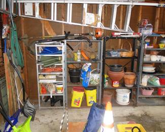 Shelving units are all for sale, and all the planters too