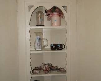 Pitchers, and tea set, and other great finds on the corner shelf