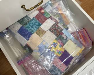 Tons and tons of fabric, bolts, squares and more