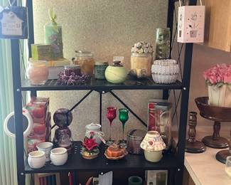 How about some candles - we have one that is a giant poinsettia plant, and check out the candy cane one. So festive for the holidays.