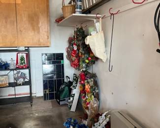 some Christmas wreathes (still working in garage) - check out that stained glass window in the back!   Need a ladder?