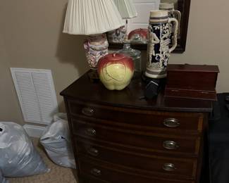 Chest of drawers with vintage Apple cookie jar and large German flagon/tankard