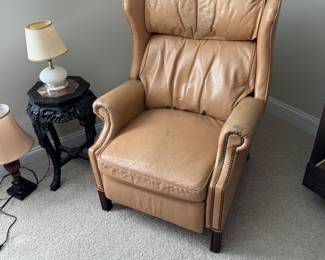 Leather recliner with antique marble top asian plant stand