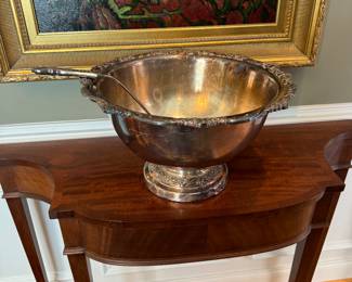 Entry table with large silver-plate punch bowl and ladle
