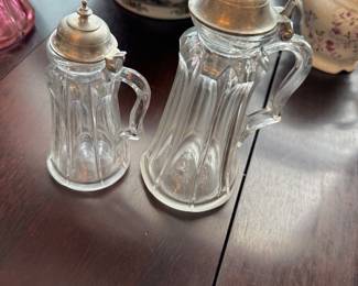 Antique syrup pitchers
