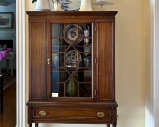 Vintage curio cabinet.