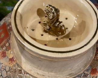 Strainer in satsuma jar