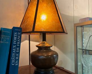 Craftsman style lamp. Hammered copper with a mica shade.