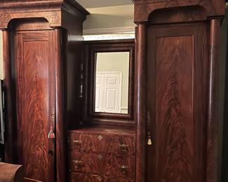 Massive mahogany wardrobe with chest of drawers and mirror. Total height 92”, total width 90”, depth 24”. 
