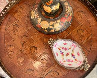 Floral inlay is meticulously hand done.