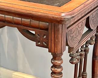 Old east lake spindle table with velvet corded inset.