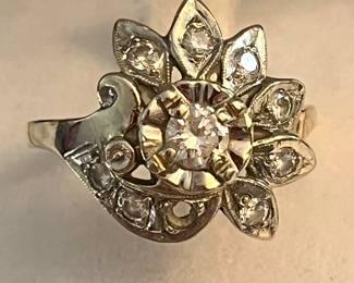 Ladies 1940 diamond cocktail ring with one stone missing