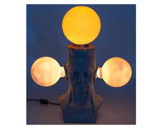 Gilbert Duran (San Antonio, Texas, 1947-2023), First Inhabitant street lamp head, with three real globe lights, originally by Waldine Amanda Tauch and discovered by Duran in a San Antonio thrift shop, cast by Duran using his custom-made mold, "First Inhabitant" bust