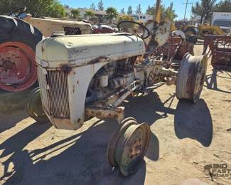 214  Early Model Ford Tractor 