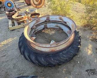 4154  2 Tractor Wheels with 1 Tire 