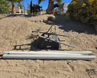 2608  Wheelbarrow and 3 Pieces of 4in PVC Pipe 