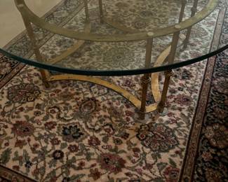 Hollywood Regency Round Glass Top Coffee Table with Brass Base, Karastan Ivory Indo-Kirman Persian Rug - 4.25 ft x 6 ft