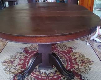 Fabulous mahogany gate leg dining room table with huge claw feet several leaves. Stunning table