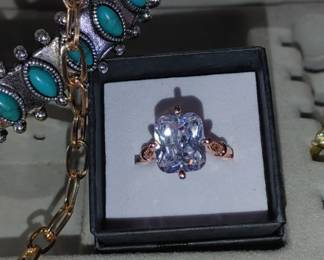 Gorgeous 925 sterling silver rose gold and emerald cut ring