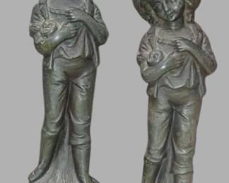 Bronze and pot metal figurines one is missing the face very heavy