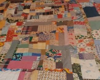 Hand stitched crazy quilt very large and the downstairs bedroom to the left of the front door