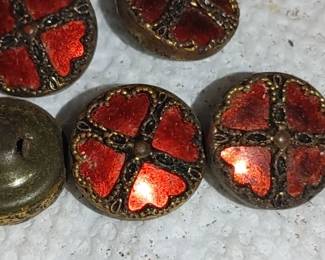 Red metal reflective buttons