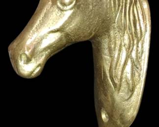 Have a cast iron brass Horse Head wall hook