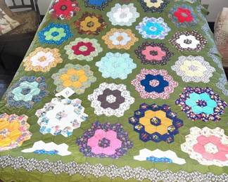 Beautiful handmade quilts at least 25 of them not all are pictured