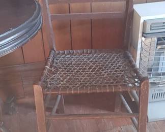 Primitive ladder back chair with rawhide bottom