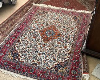 Several beautiful area rugs.
