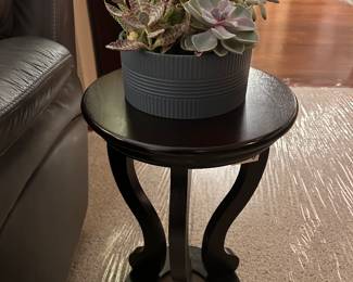 Plant stand with faux succulents 