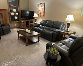 La-Z- Boy leather reclining sofa, loveseat and chair. Coffee table by Kincaid Furniture Co. 