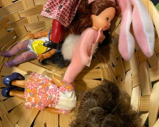 Dolls in basket