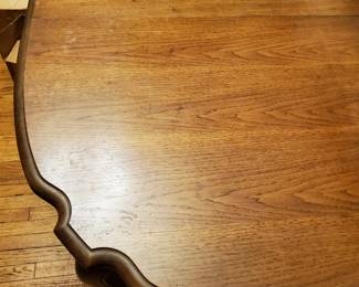 This rounded ornate-edged Queen Anne 12' dining table had (2) large leaves.  In very good condition just in time for Thanksgiving! ;-}