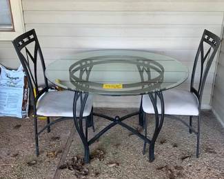Round bevel edged glass top table w/two chairs
