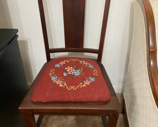 Hand embroidered seat cushion to chairs