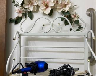 Another picture of metal stands- 2 hair dryers -decor over stands